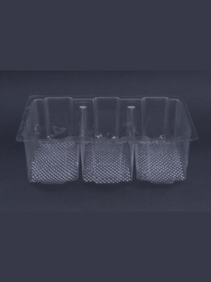 plastic tray commonly used for packaging biscuits, cookies, and slice cakes